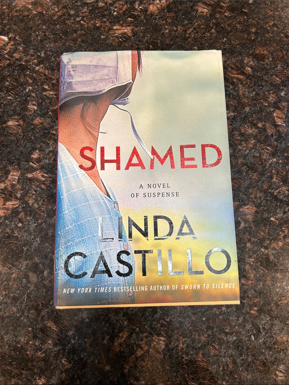 Shamed by Linda Castillo - Yellow, Blue, Red Cover